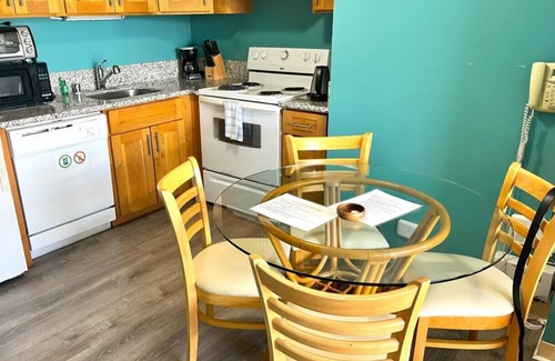 McCully - Moiliili Condominio | Total of 2 bedrooms at Royal Kuhio, Sleeps 8, with AC. Two units, same floor,