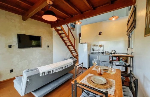 Garopaba Casa | Tourmaline studio, views of the sea, dunes and lagoon.
