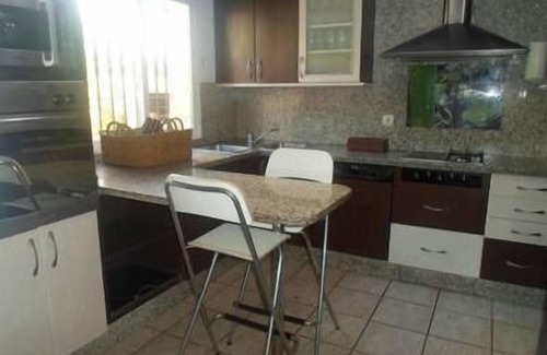 Urbanización Puerto de Estepona Casa | Casa adosada con piscina comunitaria y espectacular terraza en la azotea, cerca de la playa.