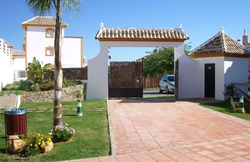 Islantilla Casa | Adosado con terraza y piscina a 15 min de la playa.