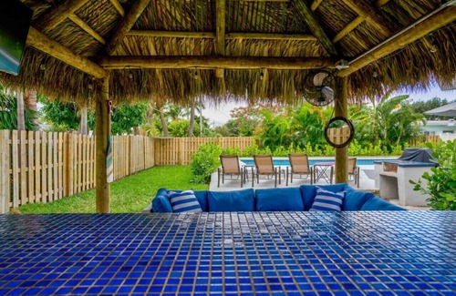 North Palm Beach Apartamento | Tradewind Estate: Entertainment Loft & Heated Saltwater Pool!
