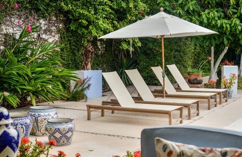 Independencia Casa | casona tradicional en Cozumel - Jardín y piscina