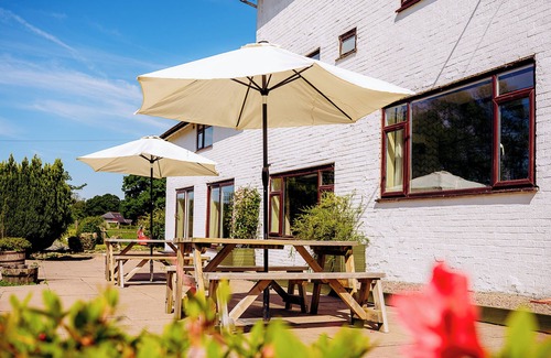 Howey Casa | Tranquil countryside retreat with stunning views, gardens, and private lake.