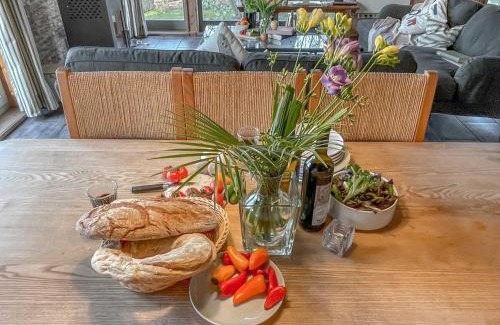 Vogelsang-Warsin Chalet De Esquí | traumHaff Küstenchalets - einzigartige Chalets an der Ostsee. Ganz aus Lärchenholz mit Kamin und Sauna
