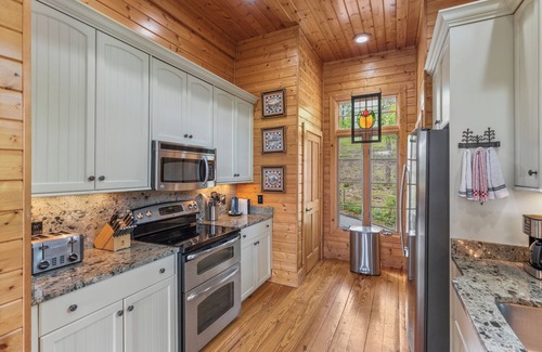 Cashiers Casa | Tree top is a 5-star mountain home with majestic views and easy lake access!