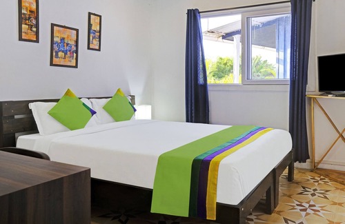 Arpora Hotel | Treebo Trend Resorte Ferro