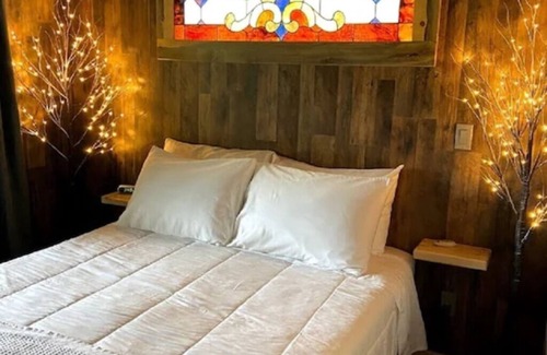 Angel Fire Cama Y Desayuno | TREEHOUSE Bed & Breakfast with stunning mountain views