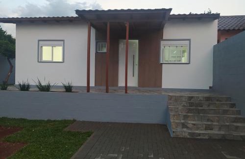 Jardim Casa | Trentino 66 - Hospedagem em Ijuí, casa agradável com estacionamento