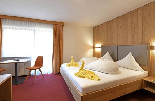 Damuels Apartamento | Triple room, bath, WC - Hotel Sonnalpen