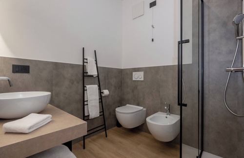 Trento Casa | Triple room consisting of double bed and single sofa bed