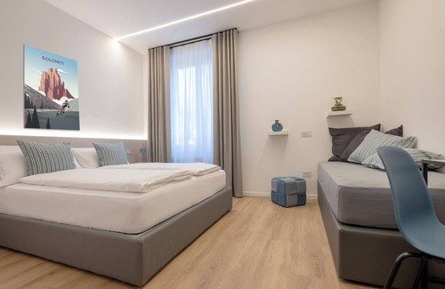 Trento Casa | Triple room consisting of double bed and single sofa bed