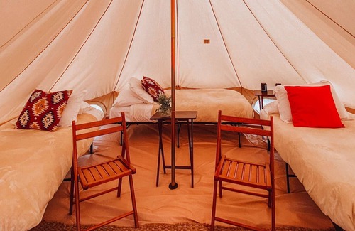 Valle Casa | Triple Tent w/ Shared Bathroom - Find us among the juniper trees and open sky.