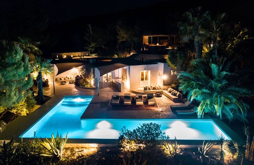 Sant Antoni de Portmany Villa | Villa de lujo tropical, 7 habitaciones con baño privado, vistas al mar / atardecer