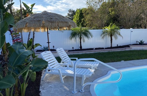 Largo Casa | Tropical Backyard Heated Pool House Close to Beach