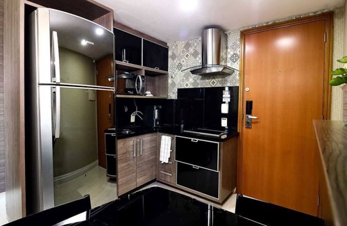 Ponta Negra Apartamento | Tropical Executive Suite Kitchenette Water View