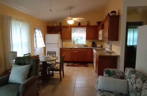 Englewood South Cabaña | Tropical Garden Cottage only 3 miles to beautiful Englewood Beach. Pet-friendly!