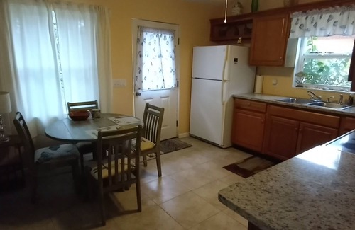 Englewood South Cabaña | Tropical Garden Cottage only 3 miles to beautiful Englewood Beach. Pet-friendly!