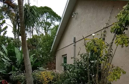 Englewood South Cabaña | Tropical Garden Cottage only 3 miles to beautiful Englewood Beach. Pet-friendly!