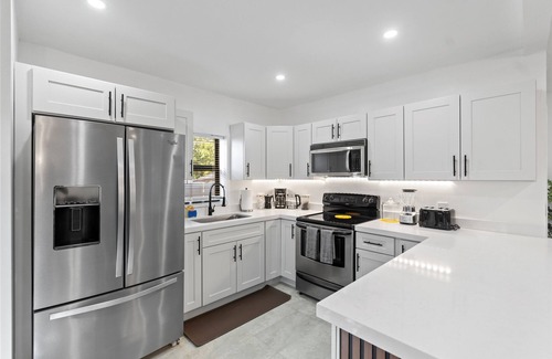 Central Oakland Park Casa | Tropical Getaway w Huge Yard! BNR Vacation Rentals