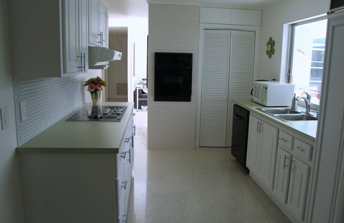 Hobe Sound Casa | Casa tropical con piscina climatizada cerca de las playas