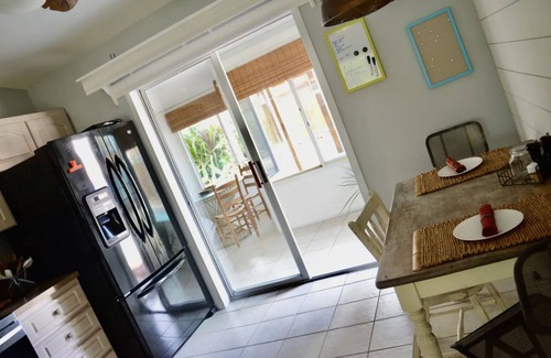 Fowlers Casa | Tropical Island House, Heated Pool, Near Beach, Disney, Kennedy Space Center