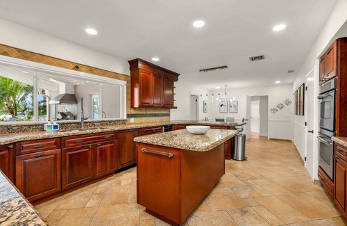 Ojus Casa | Tropical Waterfront Family Oasis - Heated Pool - Near the Beach & Aventura Mall!