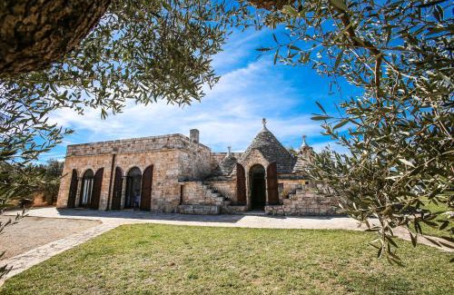 San Michele Salentino Casa | trullo degli ulivi con piscina e vasca per bambini