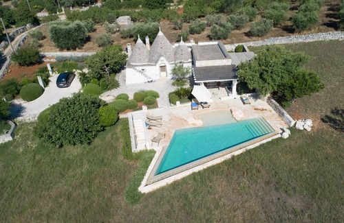 Ostuni Casa | Hermoso Trullo, vistas panorámicas excepcionales, piscina infinita impresionante, WiFi