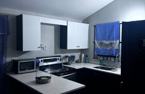 Spring Village Casa | Ts Staycation - a charming 2-bedroom house with WiFi, AC in Spanish Town