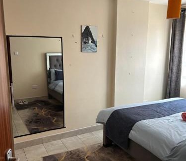 Kasarani Apartamento | Tulia 1 BR apartment in Kasarani Nairobi with washing machine, lift , wifi, office desk and parking