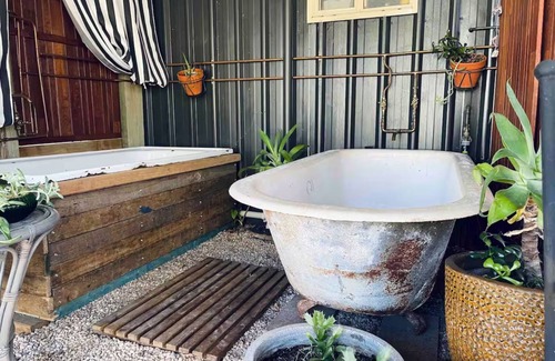 Ballandean Cabaña | Tulip Cottage in Wine Country with fireplace, garden and outdoor bath house,