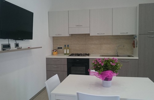 Calasetta Apartamento | Casa turquesa a pocos pasos de la playa con vista al mar (IUN P7111)