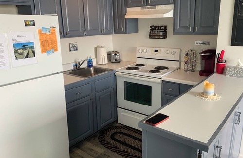 Manitou Beach-Devils Lake Cabaña | Two Bed Rooms with a sunrise lakefront view