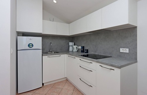 Suha Punta Apartamento | Apartamento para dos personas con terraza y vista al mar Suha Punta, Rab (A-17239-b)