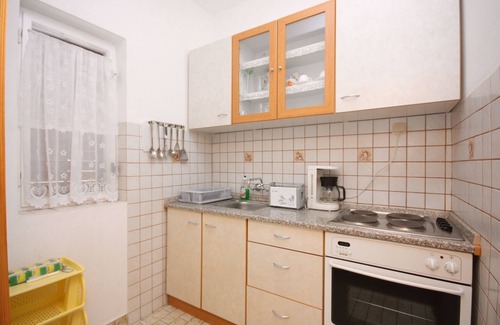 Suha Punta Apartamento | Apartamento para dos personas con terraza y vista al mar Kampor, Rab (A-4984-a)