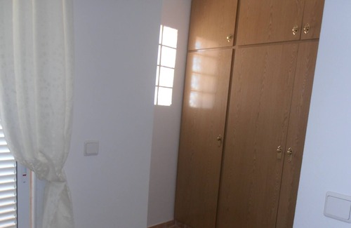 Monte Faro Casa | Casa adosada de dos habitaciones, piscina comunitaria, wifi, televisión del Reino Unido y cancha deportiva