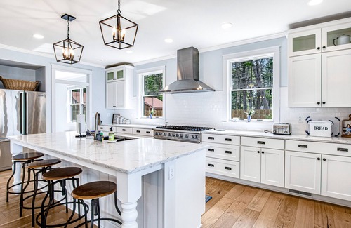 St Germain Casa | Two dog-friendly lakefront homes with docks, kayaks, rowboat, firepits & beach