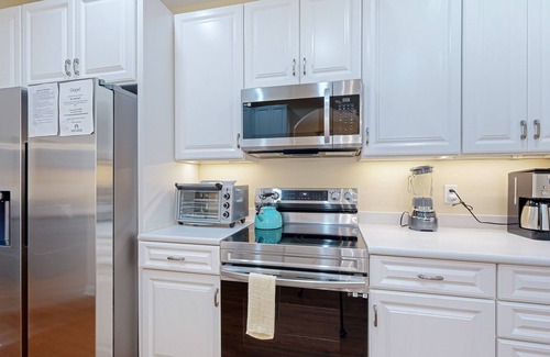 The Commons Casa | Two-level Bayside Resort house with heated pool, hot tub, fireplace & AC