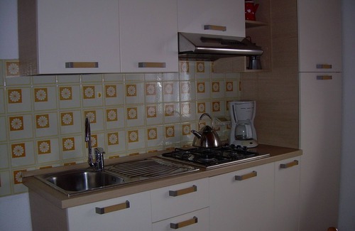 Castelletto Apartamento | Ático de dos habitaciones en Casa Mary con vista al lago y al jardín.
