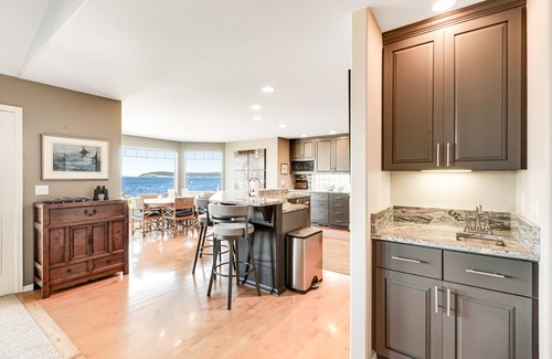 Freeland Casa | Two-story, bay front retreat with a deck, direct beach access, and washer/dryer