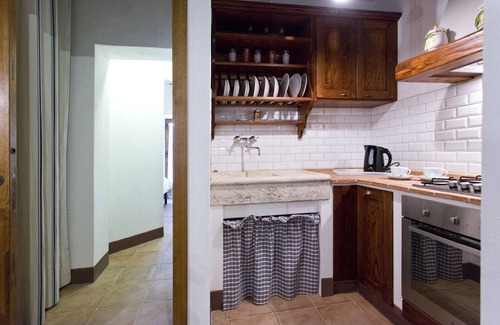 Monticiano Apartamento | Típica residencia toscana en un antiguo pueblo a las afueras de Siena
