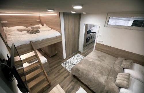 Dolni Morava Apartamento | U Králíka, přízemní bezbarierové apartmány A,B,C,D - 50 metrů od vleku - přejdete v lyžácích, pod bobovou dráhou, parkování zdarma, lyžárna s vysoušeči bot,