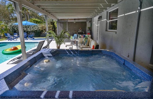 Seminole Villa | Ultimate Beach Getaway · Mins from Beach · Hot Tub · Heated Pool · Game Room