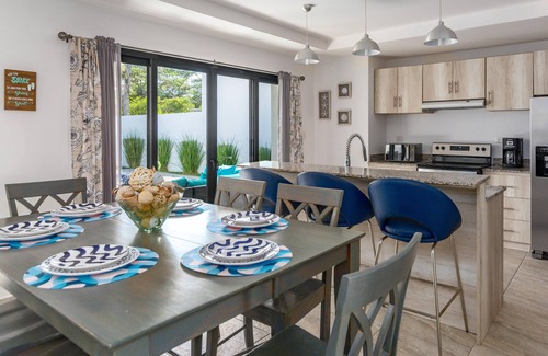 Potrero Villa | Ultramodern Townhome with an Inviting Coastal Design and Lush Outdoor Oasis with a Private Pool