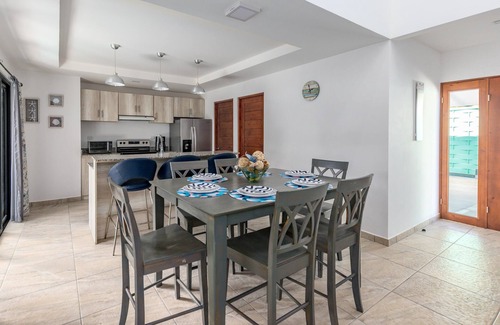 Potrero Villa | Ultramodern Townhome with an Inviting Coastal Design and Lush Outdoor Oasis with a Private Pool