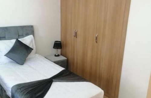 Agdal Apartamento | Un élégant appartement meublé à louer à Marrakech avec deux piscines et une vue magnifique