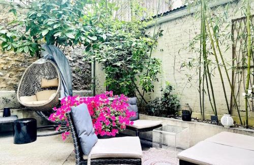 Porte-Dauphine Apartamento | Un appartement de deux chambres climatisé avec un jardin privatif près de Trocadero