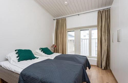 Downtown Kuopio Apartamento | Uniikki kattohuoneisto ydinkeskustassa, lämmin pysäköinti, max 6 hlöä