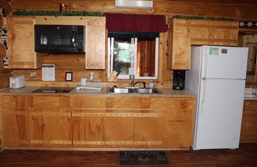 Anchor Point Cabina | Excepcionalmente Alaska, Bienes Iniciar Vacation Homes Situado en una granja de 14 acres Natural