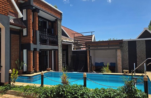 Karatu Apartamento | Unique Homestays A - 2 bedrooms with swimming pool and Free Wi-Fi